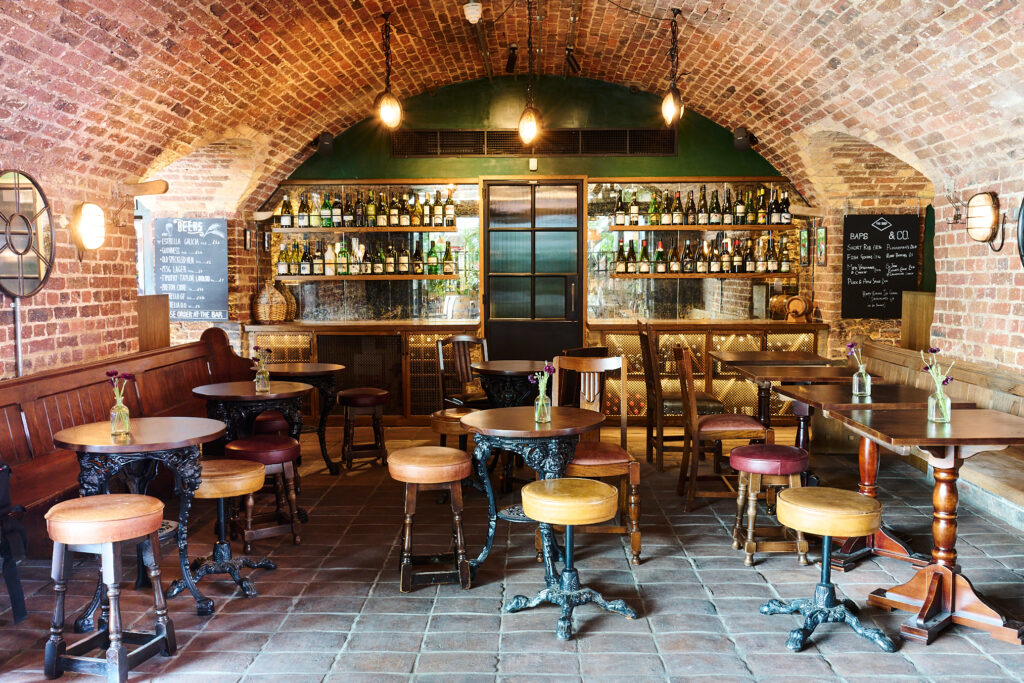 interior of The Drop, a neighborhood bar in Coal Drops Yard